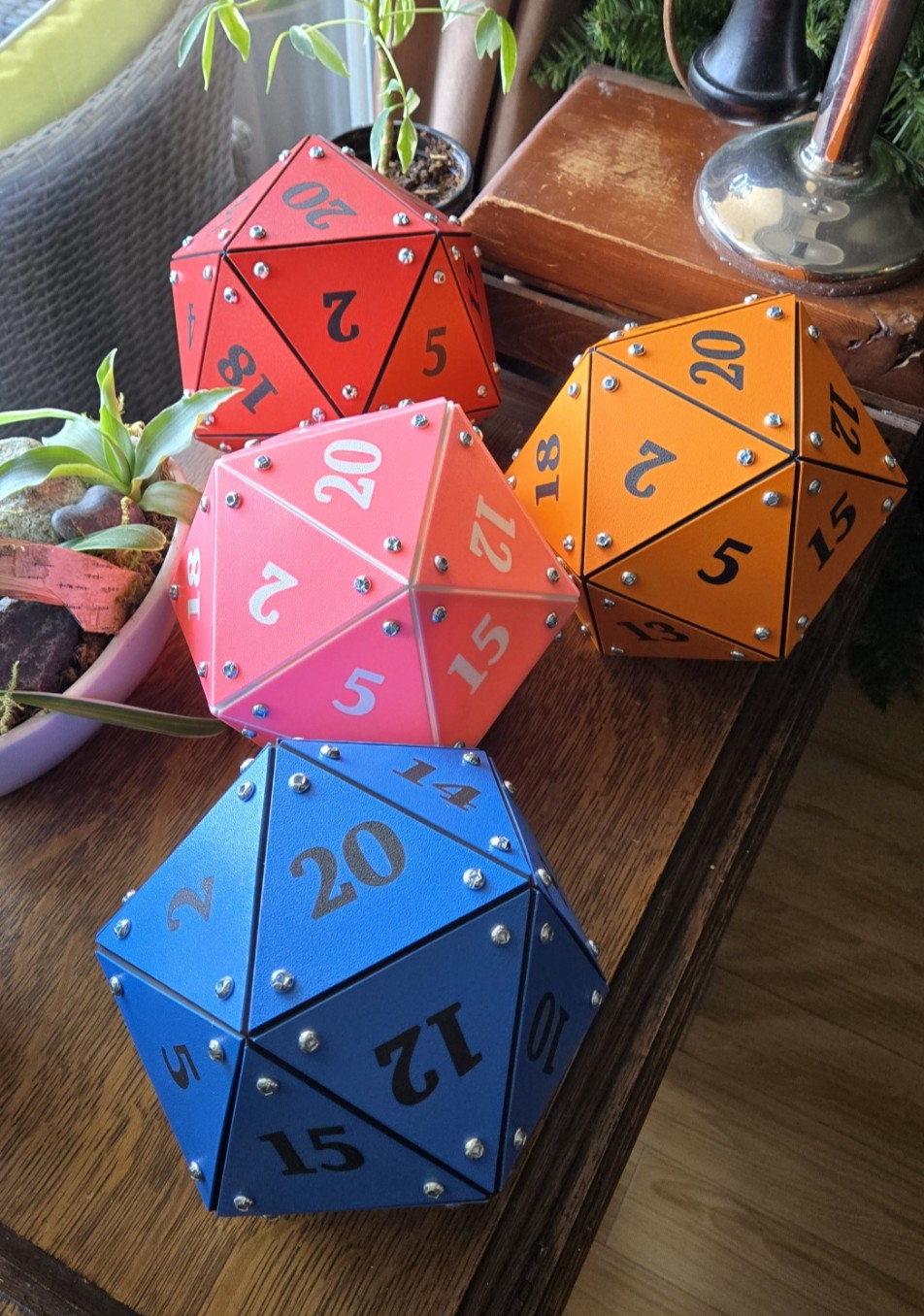 Top-down view of all four Dice Vault colours